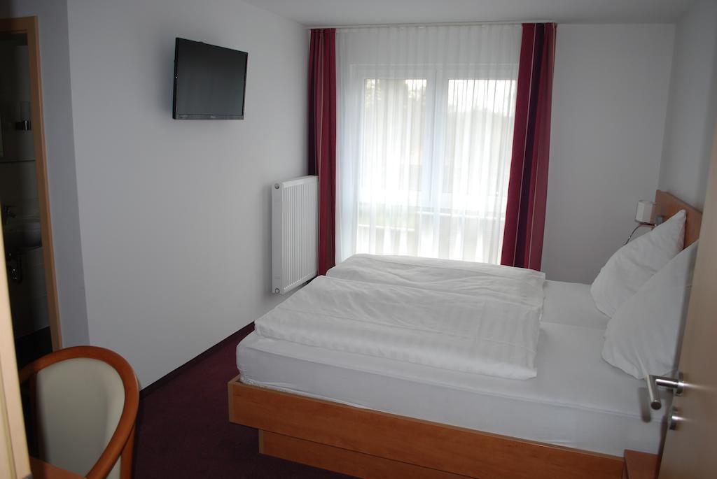 Hotel Lohmann Munique Quarto foto